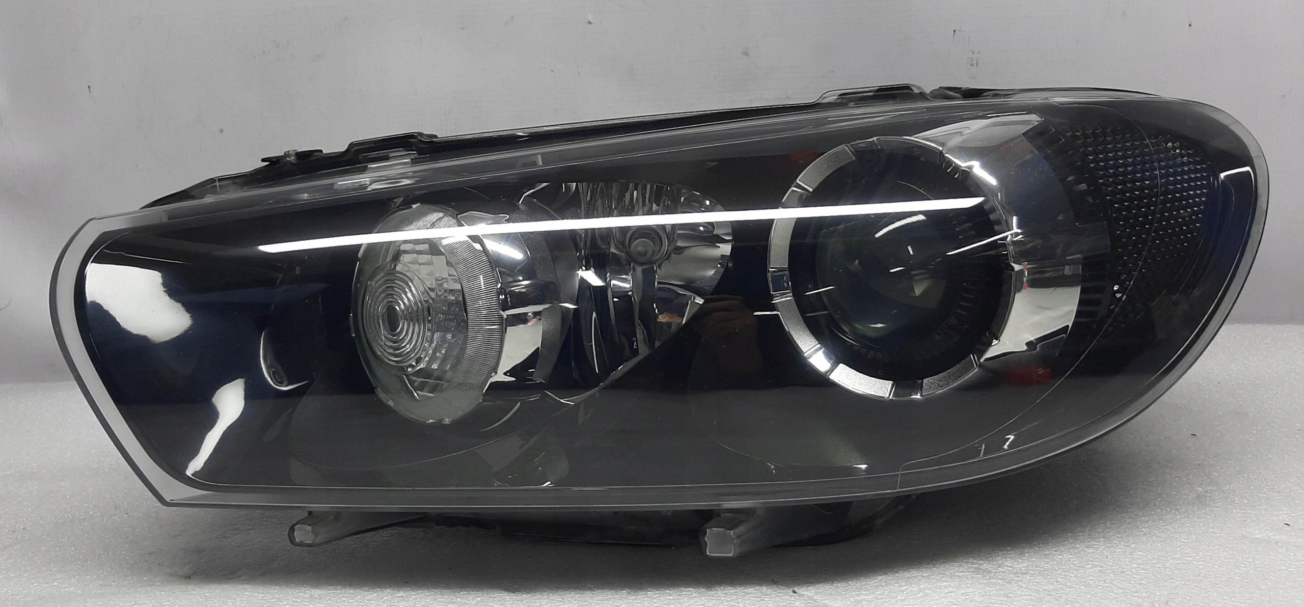 VW Scirocco Lampa lewa Reflektor Xenon 1K8941753B